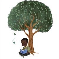 Boy with book by tree